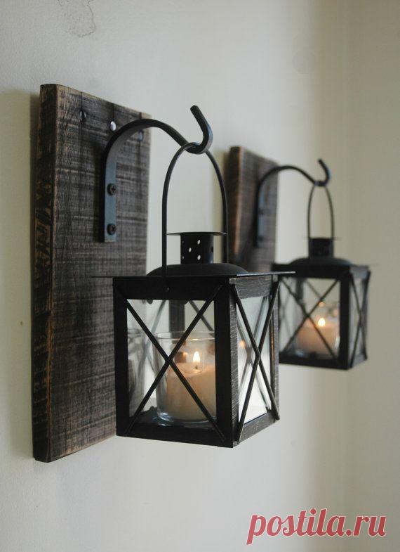 Lantern Pair with wrought iron hooks on recycled wood board for unique wall…