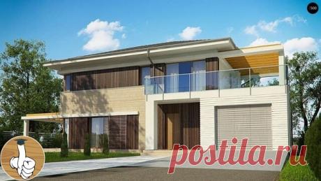 Современный двухэтажный дом с гаражом и большими террасами.