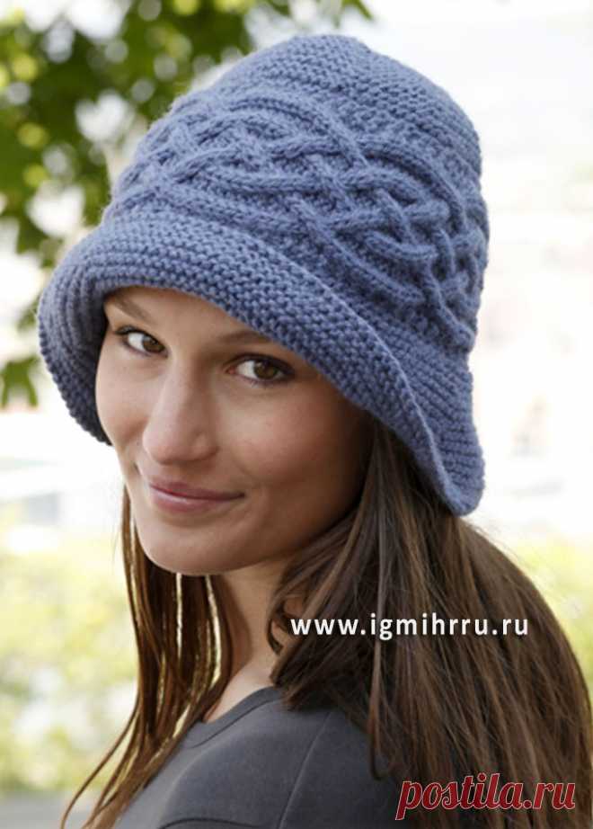 Голубая шляпка с арановыми узорами. Спицы