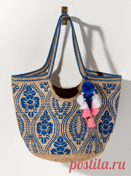 Paola Tote Get ready for your next tropical vacation or beach getaway with our spacious Jute Tote Bag! Made with durable jute material, this bag is not only eco-friendly, but also perfect for carrying all your essentials in style. The natural jute color and texture give it a rustic, beachy vibe that will complement any summer out