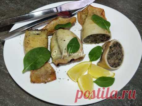 Кальмары, фаршированные грибами и сыром