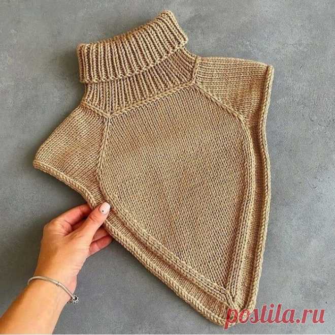 Краткое описание манишки из мериносовой пряжи.