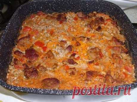 Перловая каша с мясом и овощами в духовке