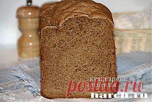Пшенично-ржаной хлеб с овсяными хлопьями.