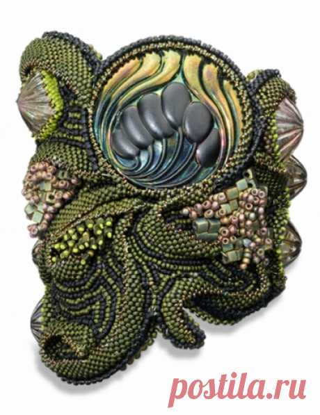 Jewelry : "Serpentine Cuff" (Original art by Linda Rettich ) 7" wide x 4" high cuff that is bead-embroidered and off-loom bead-woven using seed beads, a variety of decorative beads, Vintage German Glass cabochons & large vintage button/hatpin. It is backed with leather.. Original Jewelry
