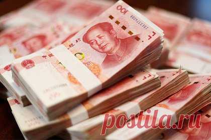 Желание Минфина переводить российский госдолг на юани объяснили