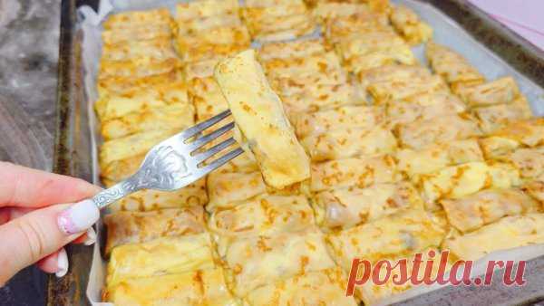 Знаменитые налистники. Тающие блины с творогом в духовке по домашнему рецепту.
Сегодня приготовим легендарные мини-налистники. Это томлёные малюсенькие блинчики с воздушной, как облако, начинкой. А главный секрет этих блинчиков — в их простоте. 
Ингредиенты на 25 шт:
- Молоко — 800 мл
- Яйца — 4 шт
- Сахар — 1,5 ст.л.
- Соль — щепотка
- Пшеничная мука — 250 г 
- Кукурузный крахмал — 2 ст.л.
- Вода (для замачивания изюма) — 100 мл 
- Растительное масло — 3 ст.л. 
Начинка:
-...