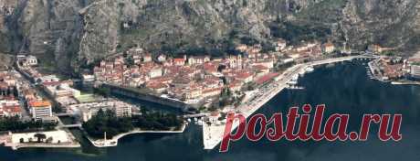 (7) This is Montenegro
Kotor (Italian: Cattaro) is a coastal town in Montenegro. It is located in a secluded part of the Gulf of Kotor. The city has a population of 13,510 and is the administrative center of Kotor Municipality.

The old Mediterranean port of Kotor is surrounded by fortifications built during the Venetian period. It is located on the Bay of Kotor (Boka Kotorska), one of the most indented parts of the Adriatic Sea. Some have called the southern-most fjord in Europe.