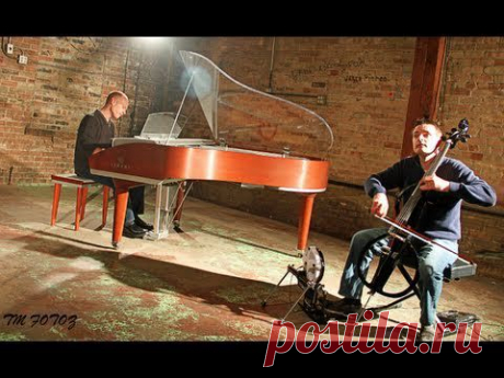 Michael Meets Mozart - 1 Piano, 2 Guys, 100 Cello Tracks - ThePianoGuys - YouTube: это произведение - плод совместной работы Джона Шмидта и его друга виолончелиста Стивена Шарпа Нельсона; в нем они объединили наследие двух величайших музыкальных фигур - Майкла Джексона и Вольфганга Амадея Моцарта
