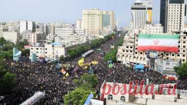 Траурное шествие проходит в родном городе погибшего президента Ирана