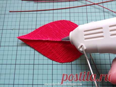 DIY Crepe Paper Poinsettia.  Mitered crepe paper leaves tutorial.