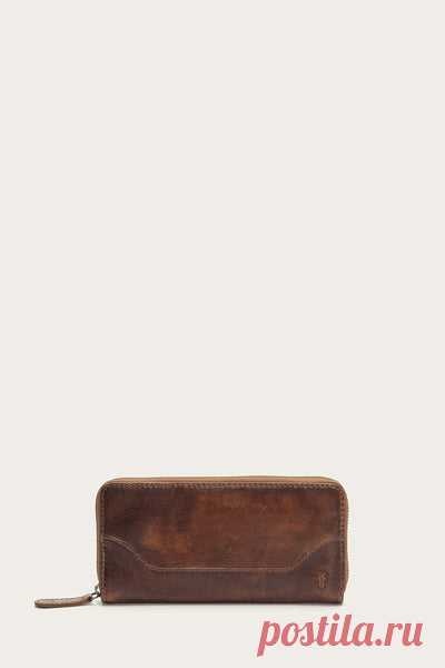 Melissa Zip Wallet A modern classic you'll never want to leave home without. Handcrafted from beautiful antique pull-up Italian leather, this continental wallet gets noticed for its well-loved, worn-in look. Designed to organize your cash, cards and a few extras, stash it in your bag or grab it and go when you're in the mood to keep things light. - Italian leather - 4