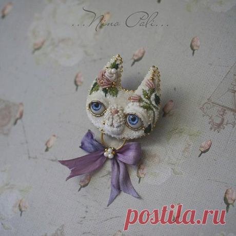 Воротнички и броши Nino Pali