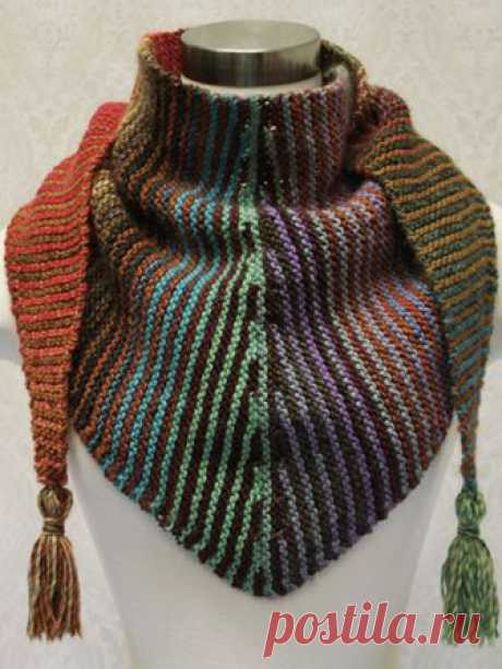 Stripes & Short Rows Design by Lena Skvagerson   Supplies Needed:   Plymouth Yarn Gina (worsted weight; 100% wool; 109 yds/50g per ball):   2 balls each green/teal/purple/red variegated #0012 (A) and red/green/copper variegated #0002 (B)    Size 8 (5mm) needles or size needed to obtain gauge  Cardboard (for tassels)