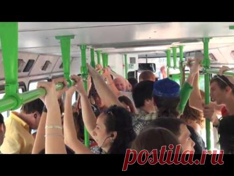 A Russian flashmob sings a Russian national song in a bus. - YouTube