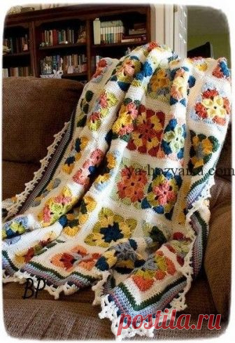 Плед из мотивов крючком. Связать такой плед можно из остатков пряжи используя различные сочетания цветов