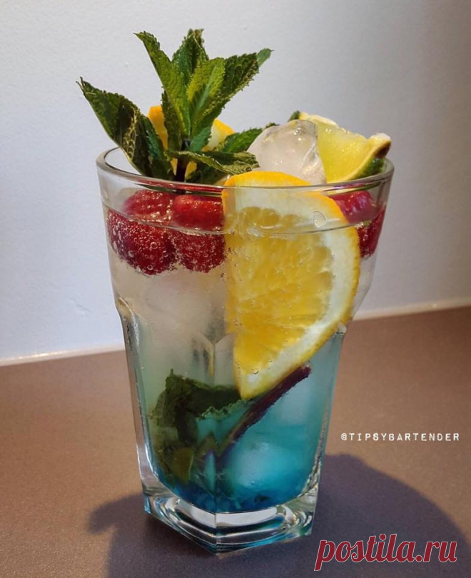 The Le Clou Special Cocktail - TipsyBartender.com Try something new and get a The Le Clou Special Cocktail!  The The Le Clou Special Cocktail is made with Blue Curacao, Rum, Oranges, Mint, and Lime! 