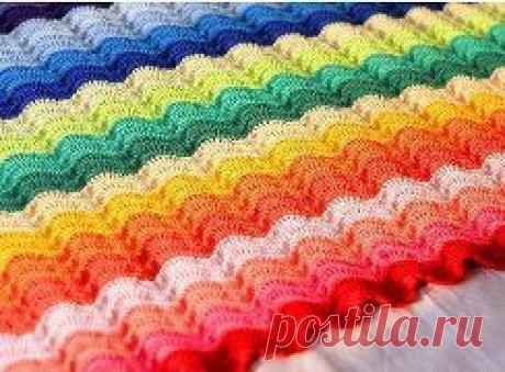 Радужный плед крючком

Очень яркий и летний плед. Вяжется просто. Выпуклые столбики придают пледу рельефность. Главное подобрать цвета ниток. Если не очень устраивает такая яркость можно подобрать цвета по спокойнее.