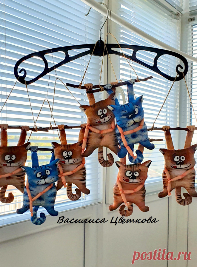 Кот с сосисками