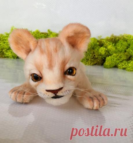 Simba? by Elena Kirillova The Lion Baby /Simba? Sewed by the author's pattern of faux fur of high quality. OOAK. Its size is about 22cm to the tail. A skeleton is laid inside the body. Paws, ears and tail are reinforced with wire and you can change the position. Body and head stuffed - a mixture of wool...