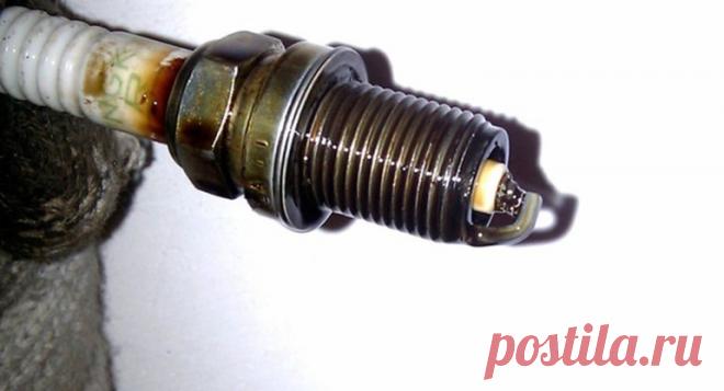 Причины появления масла на свечах зажигания