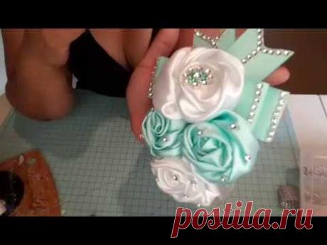 Diadema/bandita con flor de satin
