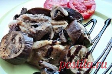 Курица с баклажанами и грибами в духовке.