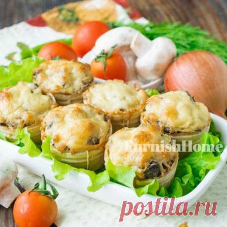 Тарталетки с жульеном из куриной печени Рекомендую приготовить вкусную и сытную горячую закуску в тарталетках. В качестве начинки для вафельных корзиночек будем использовать жульен из куриной печени и шампиньонов.