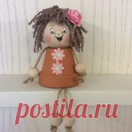 Flower pot people  These are cute flower pot dolls made using a terracotta flower pot,wooden head,string for the arms and legs,wool for their hair and a pretty paper rose in their hair. Hair colour is brown and the face expression will be a random pick of smiley,surprise...