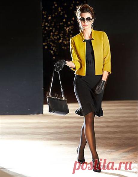 Strickkleid mit Rüschen in der Farbe schwarz - im Madeleine Mode Onlineshop
