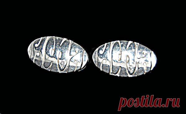 запонки в овале