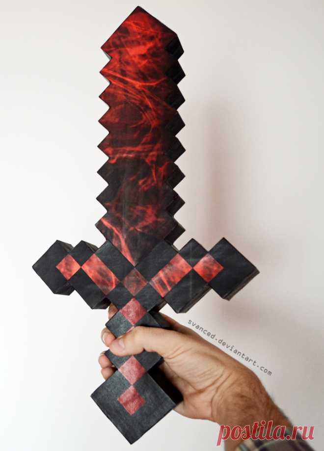 Minecraft Ruby Sword Papercraft 3 This one is more of a personal touch on an existing sword.The Ruby Sword can be found in Minecraft Tekkit and I have added a comparison on the left side of the image.For my design,I used the textur...