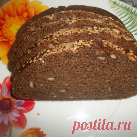 Хлеб домашний с семенами подсолнечника,с корочкой  в кунжуте