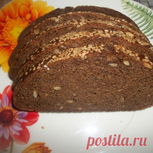 Хлеб домашний с семенами подсолнечника,с корочкой  в кунжуте