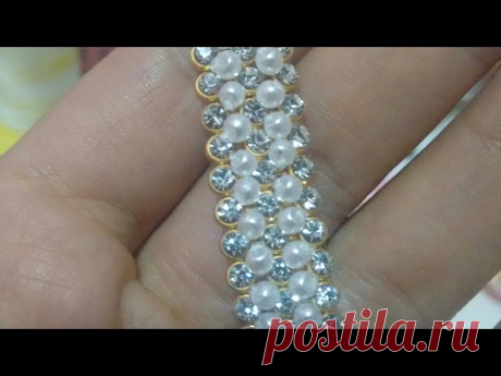 ENTREMEIO BORDADO COM PEROLAS NA MANTA DE STRASS