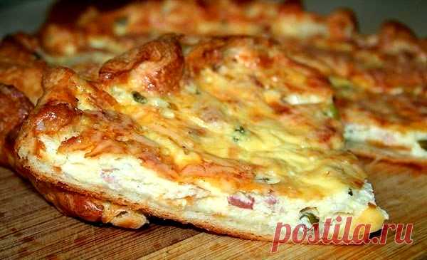 Пирог с беконом и сыром 
Рецепт приготовления вкусного пирога с беконом и сыром.