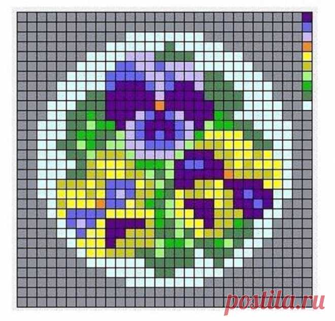 a cross - stitch pattern with flowers in the center on a white plate and gray background