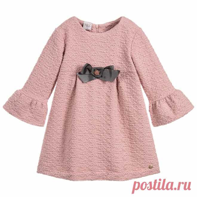 Girls Pink Jersey Dress  Girls dusky pink dress with bell sleeves by Paz Rodriguez. Made in a soft and stretchy jacquard fabric and decorated on the front with a grey grosgrain ribbon bow and a glittering crystal jewel in the centre. 
