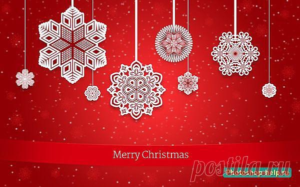 Рождественская открытка с декоративными снежинками на красном фоне в Фотошопе
