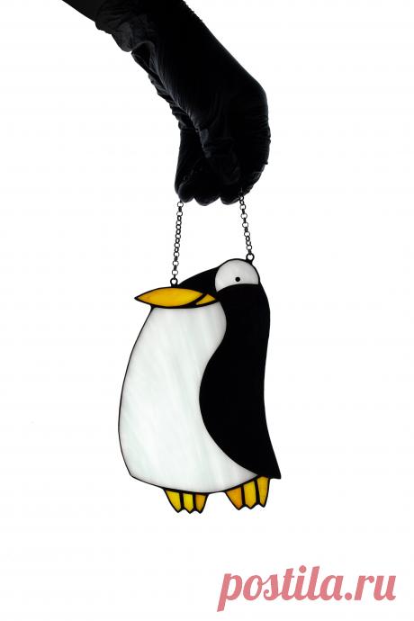 Penguin stained glass suncatcher Window hanging glass bird Mother's da Window hanging suncatcher made of stained glass pieces by my own disign.Handmade using Tiffany copper foil technique.Looks amazing in the sunlight.You will get it completely ready for installation. It comes with a self-adhesive hook and chain.It will be a great gift for friends or relatives. Width: 5 inches Height: 8 i