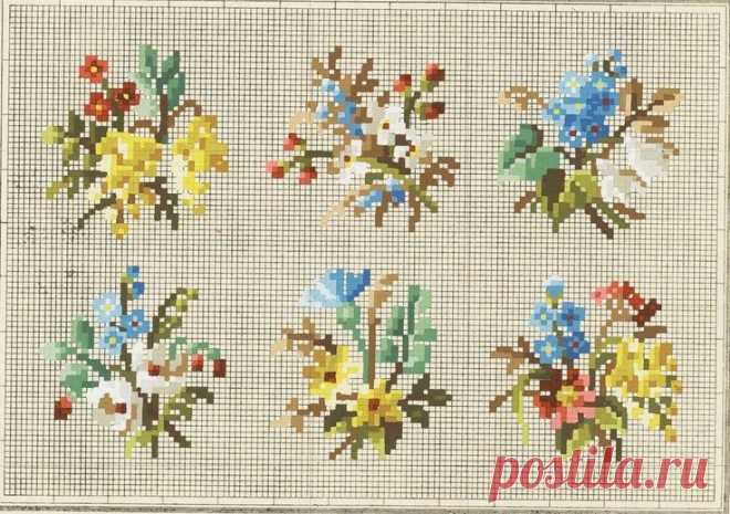 four different types of cross stitch flowers on a white background, each with various colors and sizes