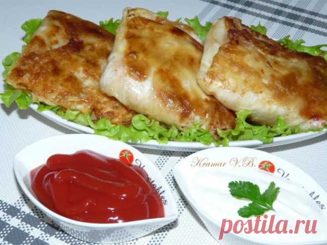 Оригинальный способ приготовления делает их еще вкуснее — голубцы в омлете!