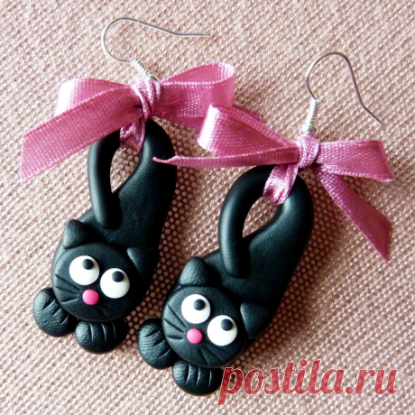 Lovely kittens Lovely, black kittens with pink bow Made of Fimo.