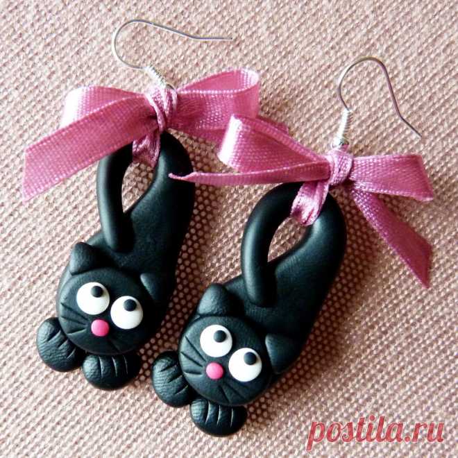 Lovely kittens Lovely, black kittens with pink bow Made of Fimo.