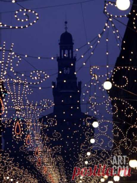 Silhouette of the Sforza Castle is Seen Through Christmas Decorations, in Milan, Italy Photographic Print at Art.com