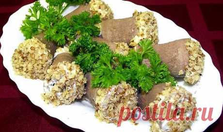 Закуска из языка с начинкой
Пробовали такую закуску из языка с начинкой в виде рулетов? Красиво и вкусно. Если у Вас намечается праздник в ближайшие дни, то возьмите её на заметку. Понравится всем. Очень вкусно!