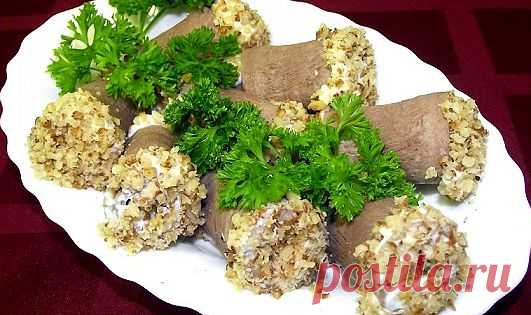 Закуска из языка с начинкой
Пробовали такую закуску из языка с начинкой в виде рулетов? Красиво и вкусно. Если у Вас намечается праздник в ближайшие дни, то возьмите её на заметку. Понравится всем. Очень вкусно!