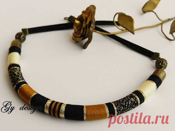 Autumn forest statement thread necklace handmade colorful thread wrapped rope necklace choker necklace Sylentri tube necklace yarn necklace This handmade necklace is wrapped with colorful cotton embroidery thread (mustard brown, black, ivory and metal gold). I used bronze tone brass finishing, chain and filigrant bronze beads, black faux suede cord  Measurements: length of the cylindric wrapped part is 8  (20 cm) and 1/3 (10 mm) diameter. Full length is 18 1/2  ( 47 cm) an...