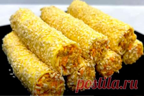 Сырные трубочки с орехами и чесноком. Замечательная закуска - КУХНИ МИРА 
 Чудесная закуска Сырные трубочки с орехами и чесноком получается нежной, красивой и невероятно вкусной. Готовится просто и из доступных продуктов Ингредиенты: Морковь небольшого размера — 1 штука Сыр плавленый в пластинках — 16 штук (или 2 пачки) Грецкие орехи — 35 граммов Яйца куриные отварные — 2 яйца Сыр твердых или полутвердых сортов — […]