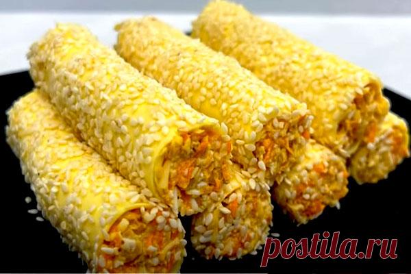 Сырные трубочки с орехами и чесноком. Замечательная закуска - КУХНИ МИРА 
 Чудесная закуска Сырные трубочки с орехами и чесноком получается нежной, красивой и невероятно вкусной. Готовится просто и из доступных продуктов Ингредиенты: Морковь небольшого размера — 1 штука Сыр плавленый в пластинках — 16 штук (или 2 пачки) Грецкие орехи — 35 граммов Яйца куриные отварные — 2 яйца Сыр твердых или полутвердых сортов — […]